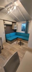 Posezení v ubytování Camping le Neptune 4 étoiles