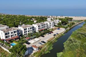 an aerial view of a city with a river at Wide Beach Apartments 236 in Mullini i Danit