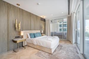 Voodi või voodid majutusasutuse High-end Quality Apartment in FIVE Palm Jumeirah toas