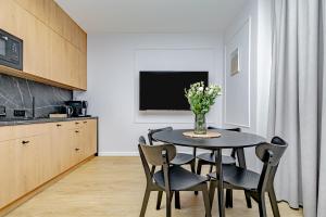 Kuchyňa alebo kuchynka v ubytovaní Glow Apartments - Apartamenty Studio KOZIA Gdańsk Śródmieście