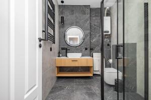 Kúpeľňa v ubytovaní Glow Apartments - Apartamenty Studio KOZIA Gdańsk Śródmieście