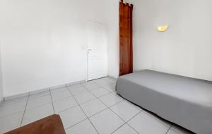 Postel nebo postele na pokoji v ubytování Charmant Duplex Lumineux