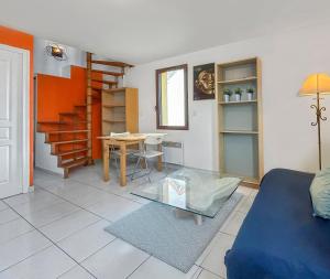 Posezení v ubytování Charmant Duplex Lumineux
