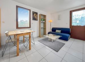 Posezení v ubytování Charmant Duplex Lumineux