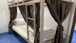 Postel nebo postele na pokoji v ubytování Zou Hostel