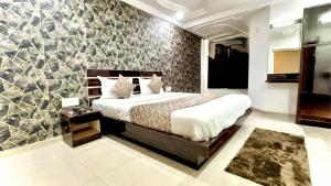 Katil atau katil-katil dalam bilik di Hotel Dev Palace