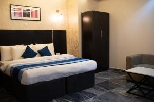 Letto o letti in una camera di Residency Hotel Lekki Phase 1