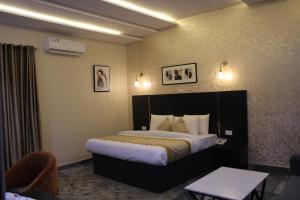Letto o letti in una camera di Residency Hotel Lekki Phase 1