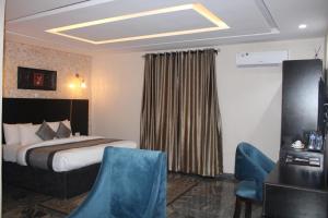 Letto o letti in una camera di Residency Hotel Lekki Phase 1