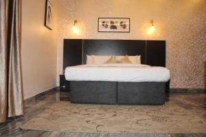 Letto o letti in una camera di Residency Hotel Lekki Phase 1
