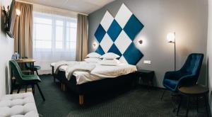 Postel nebo postele na pokoji v ubytování Centrum Hotel Viljandi