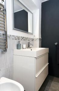 Koupelna v ubytování Casetta Garbatella + 23 fotografií