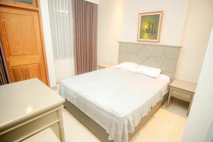 Cama o camas de una habitación en Hotel Permata Malioboro