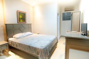 Cama o camas de una habitación en Hotel Permata Malioboro