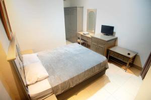 Cama o camas de una habitación en Hotel Permata Malioboro