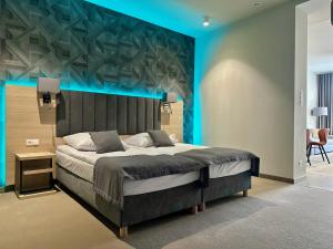 Posteľ alebo postele v izbe v ubytovaní Hotel Turkus