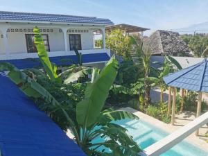 Πισίνα στο ή κοντά στο Moja Luxury Apartment Makunduchi