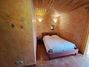 Postel nebo postele na pokoji v ubytování L'Asphodèle