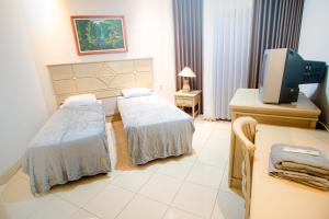 Cama o camas de una habitación en Hotel Permata Malioboro