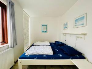 Ένα ή περισσότερα κρεβάτια σε δωμάτιο στο Lamsoor 2A*