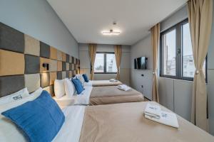 Postel nebo postele na pokoji v ubytování Hotel Garni VIZURA Sport + 37 fotografií