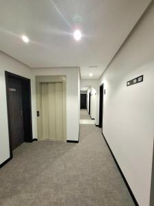 an empty hallway of an office building with a hallway at Hostal San Blas in Madrid +38 photos