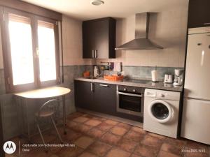 Kuchyň nebo kuchyňský kout v ubytování Casa Rural Casa Jacinta