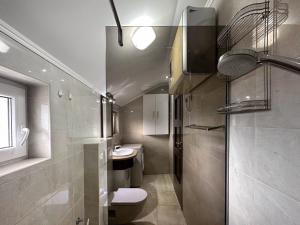 Ένα μπάνιο στο Apartment Magnolia +25 φωτογραφίες