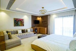 Postel nebo postele na pokoji v ubytování Riad Kasbah AMALOU