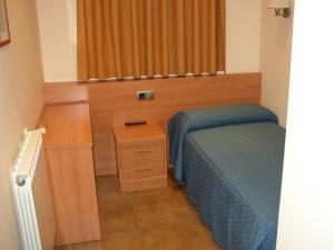 Cama o camas de una habitación en Pensió Sant Antoni
