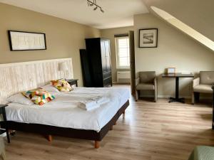 Postel nebo postele na pokoji v ubytování B&B Castellier
