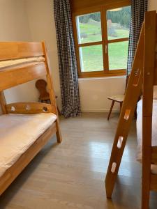 Ένα ή περισσότερα κρεβάτια σε δωμάτιο στο Ferienwohnung mit privater Sauna und direktem Zugang zur Skipiste +10 φωτογραφίες