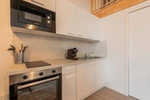 Η κουζίνα ή μικρή κουζίνα στο Studio équipé pour une personne