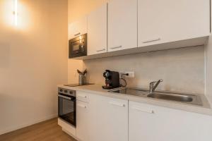 Η κουζίνα ή μικρή κουζίνα στο Studio équipé pour une personne