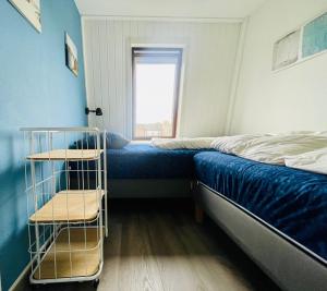 Ένα ή περισσότερα κρεβάτια σε δωμάτιο στο Lamsoor 5*