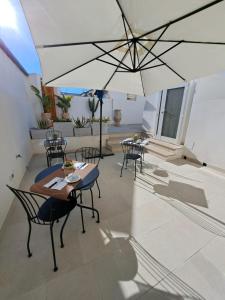 Patio nebo venkovní prostory v ubytování Le Dune Luxury Rooms