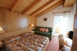Postel nebo postele na pokoji v ubytování Hotel Villa Cima Undici + 33 fotografií