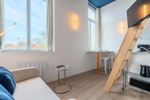 Μια τηλεόραση ή/και κέντρο ψυχαγωγίας στο Studio pour deux personnes en mezzanine