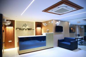 TV a/nebo společenská místnost v ubytování Novel Hotel