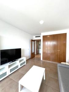 Et tv og/eller underholdning på Apartamento Boutique Jardines