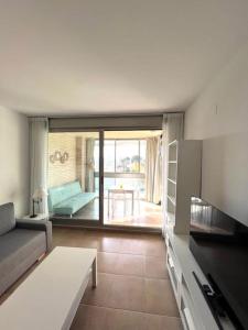 En eller flere senge i et værelse på Apartamento Boutique Jardines + 18 billeder