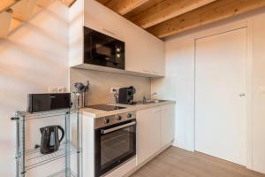 Dapur atau dapur kecil di Studio pour deux en mezzanine avec petit balcon