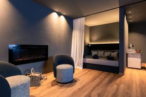 Postel nebo postele na pokoji v ubytování Hotel Alpenjuwel