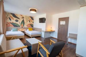 Posezení v ubytování Hotel Madeleine Biohotel