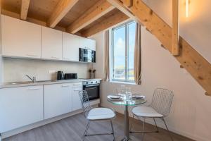 Η κουζίνα ή μικρή κουζίνα στο Grand studio pour deux personnes en mezzanine +16 φωτογραφίες