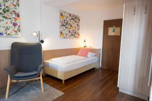 Letto o letti in una camera di Hotel Madeleine Biohotel