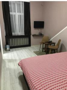 TV a/nebo společenská místnost v ubytování Fine Plus
