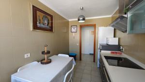 Kuchyňa alebo kuchynka v ubytovaní Apartamento Palmeras Del Sur