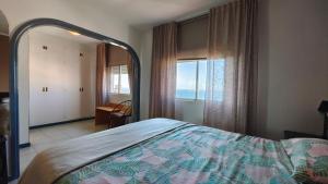 Posteľ alebo postele v izbe v ubytovaní Apartamento Palmeras Del Sur
