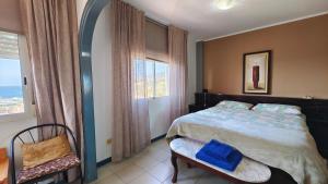 Posteľ alebo postele v izbe v ubytovaní Apartamento Palmeras Del Sur